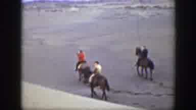 Montana (1939): Three People Riding Horses On The Beach On A Clear Day