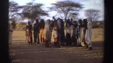 Sudan (1969): People Gathered Around In Dresses Dancing And Clapping