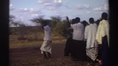 SUDAN-1969: Men In Traditional Garments Performing Cultural Dance In Village