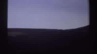 Sudan (1969): Person Wearing Pink Shirt Takes Picture Of Mountains On A Clear Day