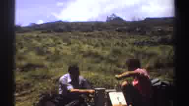 Sudan (1969): Two Men Drinking Adult Beverages In The Mountains Together