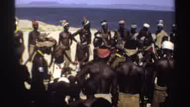 Sudan (1969): African Men And Women In Traditional Ceremonial Dress Dance Near A