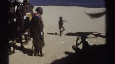 Sudan (1969): Black Tribal Group On A Sandy Beach In A Warm Climate Dancing And