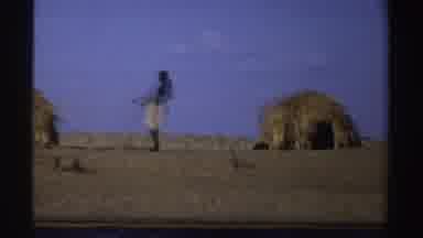 Sudan (1969): Indigenous People Standing Next To Their Homes Settled Along A River
