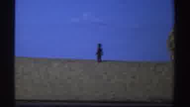 Sudan (1969): A Child Standing On The Crest Of A Hill As Clouds Roll By
