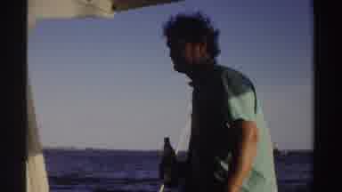 Sudan (1969): Man Drinking Beverage On A Boat In Summer