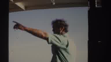 Sudan (1969): Man Wearing Blue Shirt Smokes Cigarette On A Bright Sunny Day