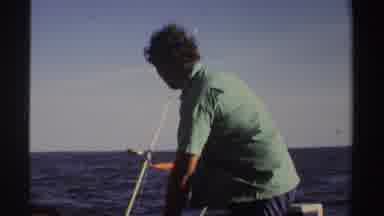 Sudan (1969): Man Moves Objects Around The Boat Then Picks Up The Fishing Rod