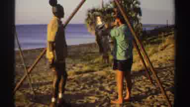 Sudan (1969): Two Men Standing Outside With A Large Fish Hanging From A Pole