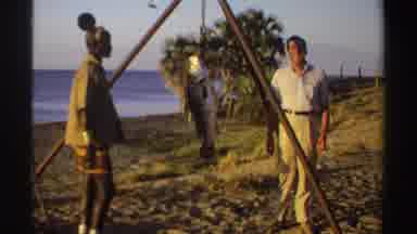 Sudan (1969): White Man Watches As A Fisherman Shows Him His Catch