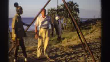 Sudan (1969): A White Man Stands As He Listens To A Black Person Talk