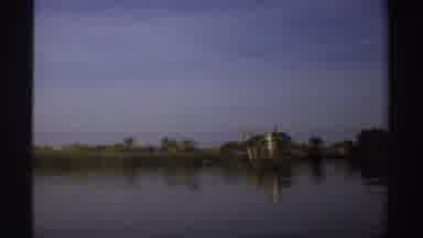 Sudan (1969): Few Birds Flying In The Lake In Different Directions And Trees Are
