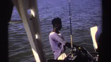 Sudan (1969): Men On A Fishing Boat Unhooking And Measuring A Fish They Caught