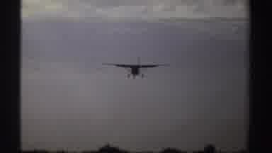 Sudan (1969): Airplane Landing In The Woods With Sky Clouds And Trees In The