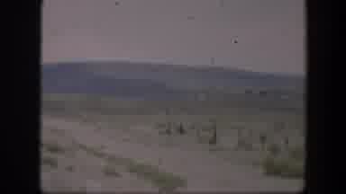 Utah (1951): Driving Down A Long Empty Road In The Dry Desert