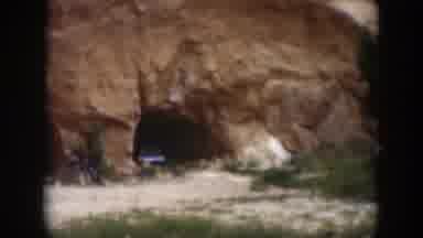 Utah (1951): Video Of Rock Face With Caves Cars And Possibly A Creepy Face