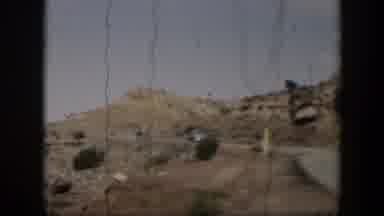 Utah (1951): Two Cars Passing Through A Road Located In The Middle Of The Desert