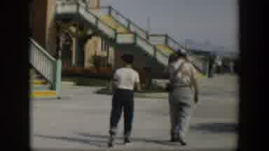 Utah (1951): People Walking Structure With Stairs And Sea Viewpoint With Boat