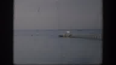 Utah (1951): View Of Long Grey Wooden Pier Over Blue Water On A Cloudy Day