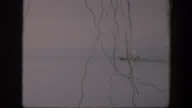 Utah (1951): Strings Flowing In Front Of A White And Gray Background