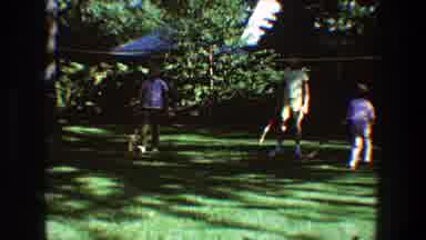 Toledo Ohio (1968): People In Backyard Playing Tennis