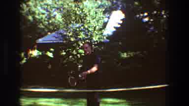 Toledo Ohio (1968): Man Tries To Be Fancy As He Goes To Serve A Shuttlecock In