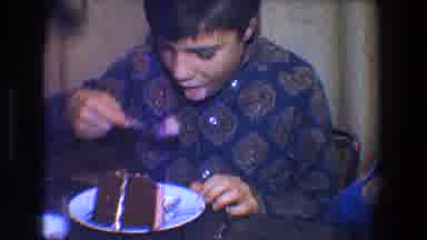 Toledo Ohio (1968): Child Enjoying Chocolate Cake