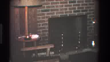 Toledo Ohio (1968): View Of Brown Chair Sitting Near Fireplace And Two Kids
