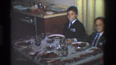 Toledo Ohio (1968): Two Boys Sit At Red And White Decorated Dining Table