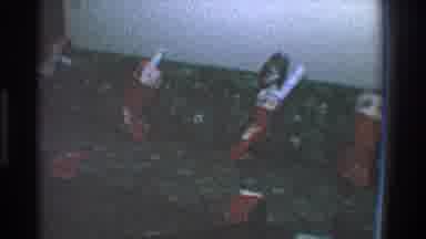 Toledo Ohio (1968): Stuffed Christmas Stockings Sit In A Line On A Couch In A