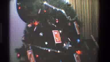 Toledo Ohio (1968): Zoom In Christmas Tree With Flashing Lights And Several Sticky
