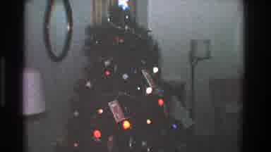 Toledo Ohio (1968): View Of Christmas Tree With Blinking Lights And Gift Boxes