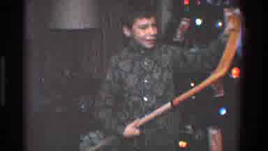 Toledo Ohio (1968): An Excited And Happy Boy Holds Up A Hockey Stick While