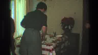 Toledo Ohio (1968): Woman Setting Up The Dinner Table While The Children Are