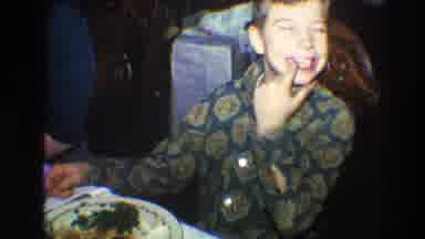 Toledo Ohio (1968): Boy Wearing Green Shirt Points At Teeth While Sitting At