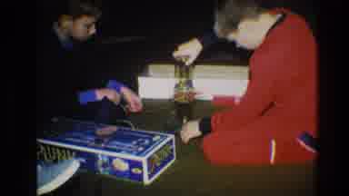 Toledo Ohio (1968): Two Brothers Playing A Game Together At Home