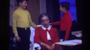 Toledo Ohio (1968): Elderly Woman Sitting On Chair In Room With Two Children