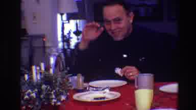 Toledo Ohio (1968): Family Waving At The Camera Gathered For Dinner At A Red Towel