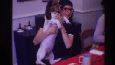 Toledo Ohio (1968): Smiling Young Boy With Dark Hair And Thick Rimmed Glasses Sits