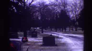 Toledo Ohio (1968): View Of Christmas Wreaths On Grey Tombstones On A Cloudy Day