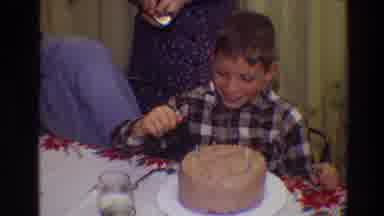 Toledo Ohio (1968): Boy Wearing Brown Shirt Gives Boy Wearing Blue Shirt Kiss On