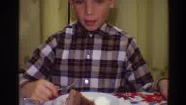 Toledo Ohio (1968): The Video Shows The Boy Eating A Chocolate Cake