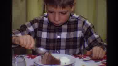 Toledo Ohio (1968): Young Boy Enjoying Thanksgiving Dessert