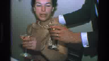 Toledo Ohio (1968): Man Approaches Sitting Woman During Party Performs Cheers