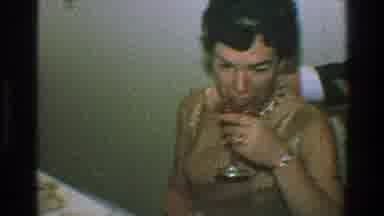 Toledo Ohio (1968): Vintage Man And Woman Kissing While Drinking Alcoholic