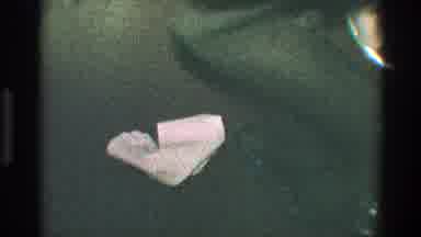 Toledo Ohio (1968): Visual Of Legs Of A Man And Woman Dancing Near A Napkin On