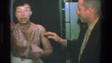 Toledo Ohio (1968): Husband Greets His Wife