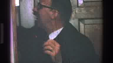 Toledo Ohio (1968): Glasses Smile Man Door Object Receiving Closet Pull Out Grab