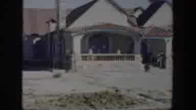 Texas (1951): People Sitting On The Front Porch Of A Home And The Smaller House