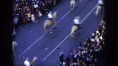 Texas (1951): A Parade Taking Place On A Street Featuring People On Horseback